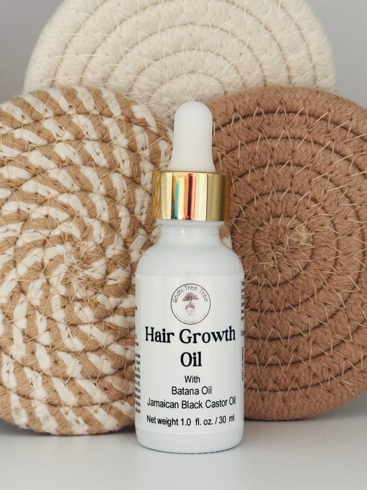 Batana oil and Jamaican Black Castor Oil, our Hair Growth Elixir is your daily ritual for stronger, thicker, and fuller hair. Infused with the sacred essence of Rosemary and nutrient-rich Argan oil, this blend stimulates growth while restoring hydration and vitality to your scalp, hairline, eyebrows—even lashes.

97% Organic | For all hair types | 1 oz.
